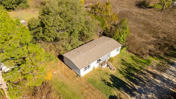 a kitchen with granite countertop a counter space a sink appliances and cabinets
