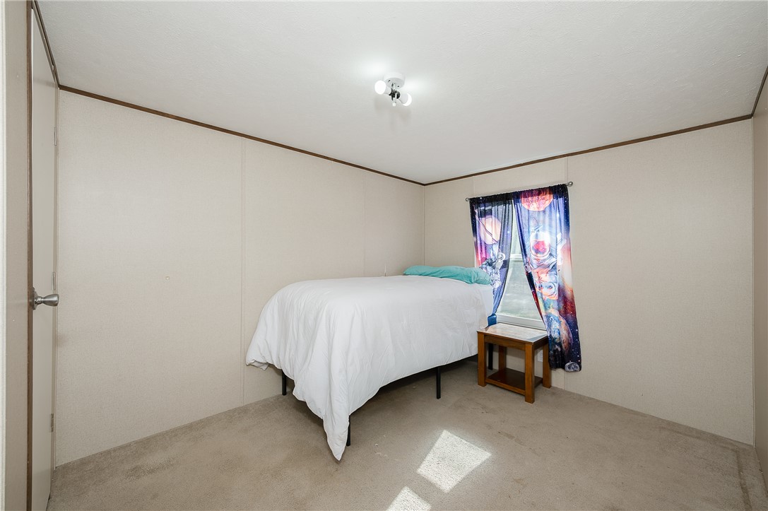 604 Sanders Rd. Lane Franklin, TX 77856 - Photo 29 of 49 View of carpeted bedroom 2