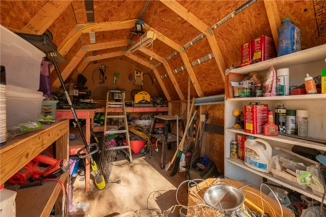 a bed room with a bed and a couch