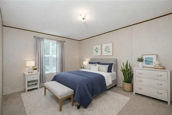 a bathroom with a granite countertop sink toilet and a mirror