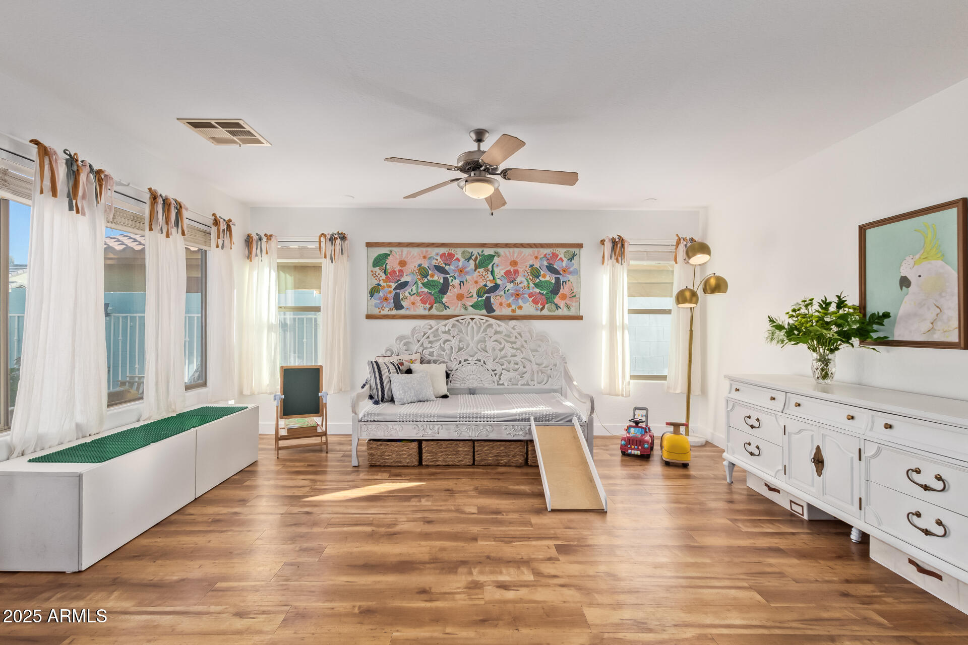 45360 West Desert Garden Road Maricopa, AZ 85139 - Photo 13 of 42 a living room with furniture and wooden floor
