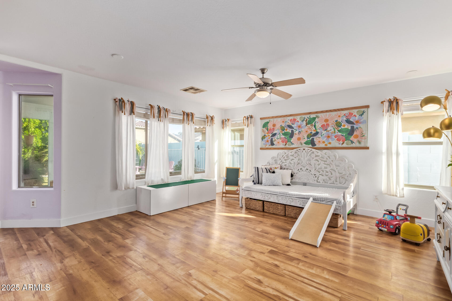 45360 West Desert Garden Road Maricopa, AZ 85139 - Photo 14 of 42 a living room with furniture and wooden floor