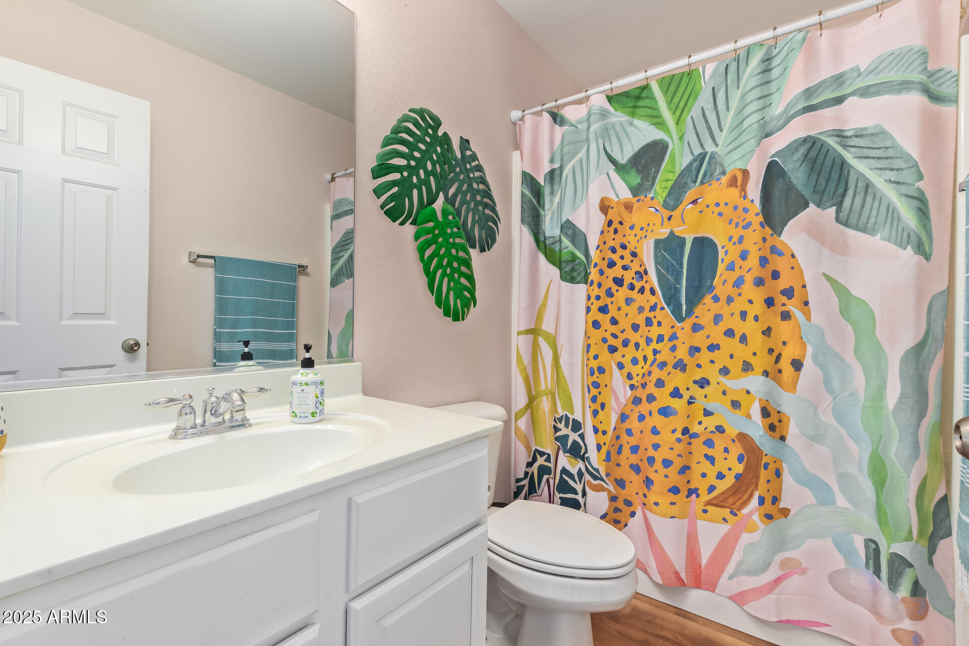 45360 West Desert Garden Road Maricopa, AZ 85139 - Photo 30 of 42 a bathroom with a sink toilet and mirror