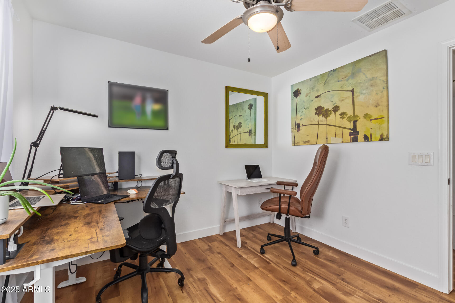 45360 West Desert Garden Road Maricopa, AZ 85139 - Photo 34 of 42 a view of a workspace with furniture and a window