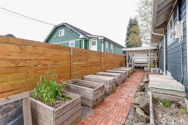 a backyard of a house with seating space