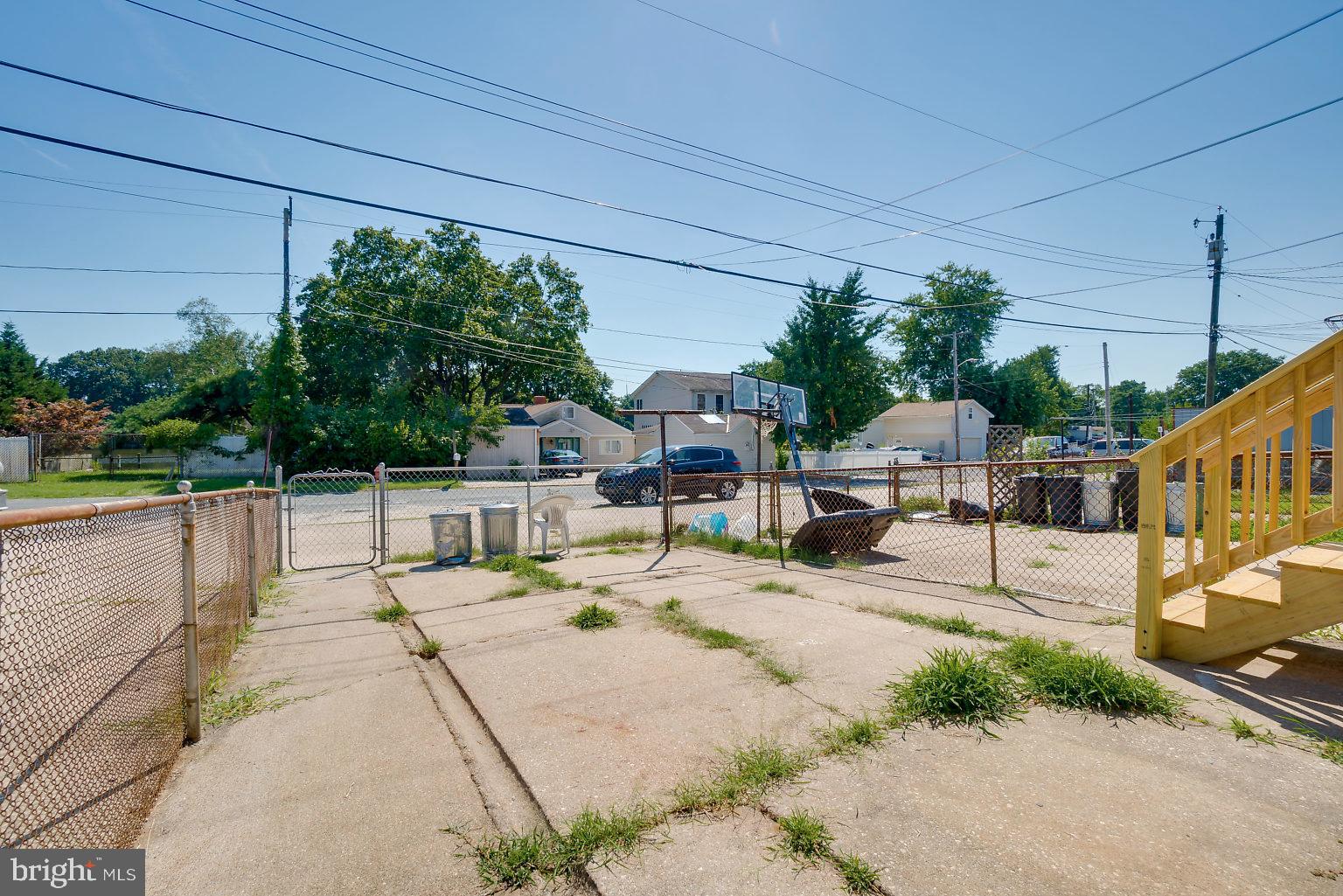 8023 Stratman Road Baltimore, MD 21222 - Photo 34 of 37 fenced backyard