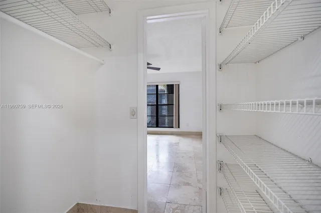 a view of an empty walk in closet