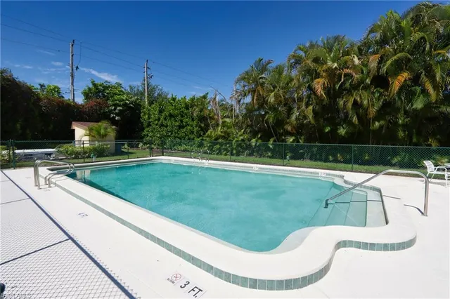a swimming pool with yard