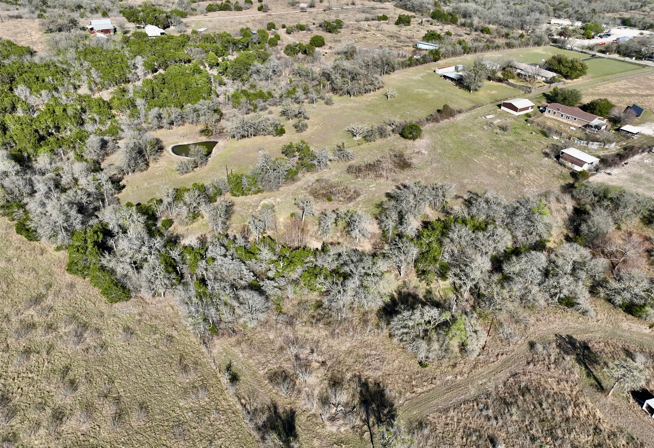 Tbd Hibbs Lane Manor, TX 78653 - Photo 12 of 14 a view of a yard with a tree
