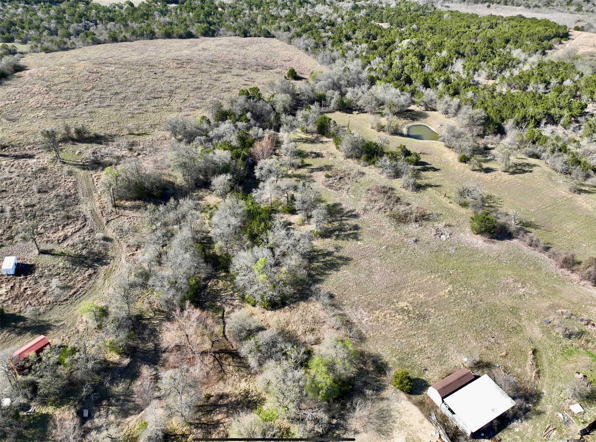 Tbd Hibbs Lane Manor, TX 78653 - Photo 14 of 14 a view of a dry yard with lots of bushes