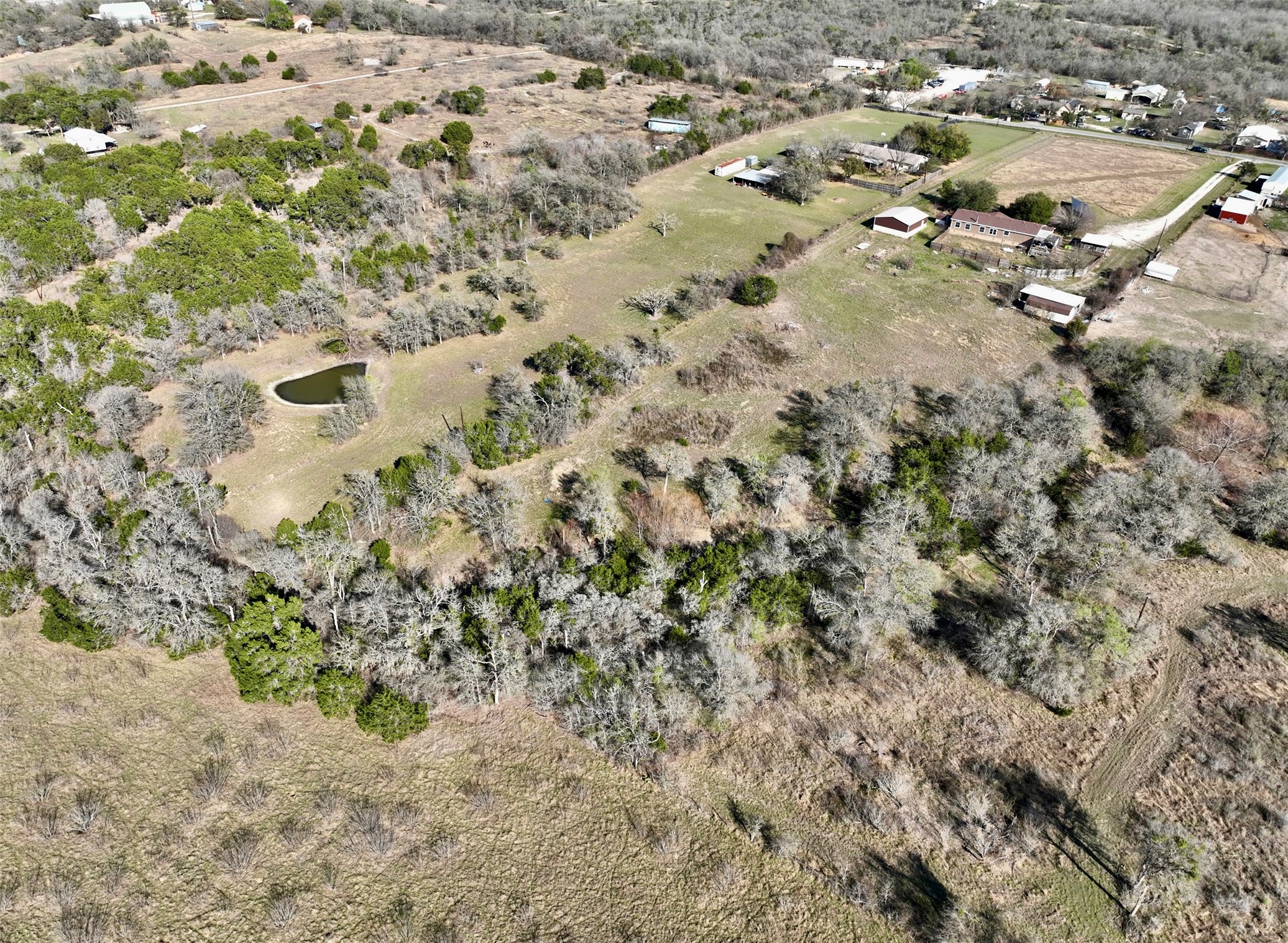 Tbd Hibbs Lane Manor, TX 78653 - Photo 3 of 14 an aerial view of residential houses with trees
