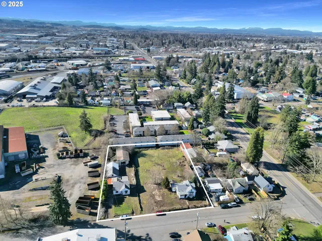 an aerial view of a city with lots of residential buildings