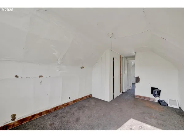 a bathroom with a bathtub and a toilet