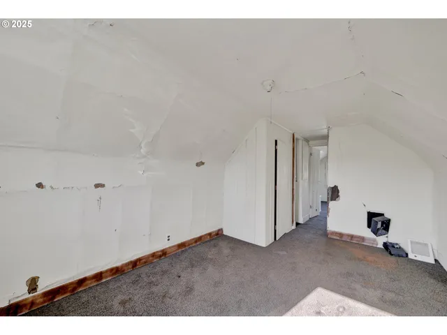 a bathroom with a bathtub and a toilet