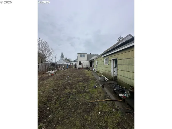 a kitchen with a sink and a stove
