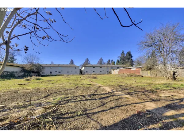 a view of an ocean and a houses