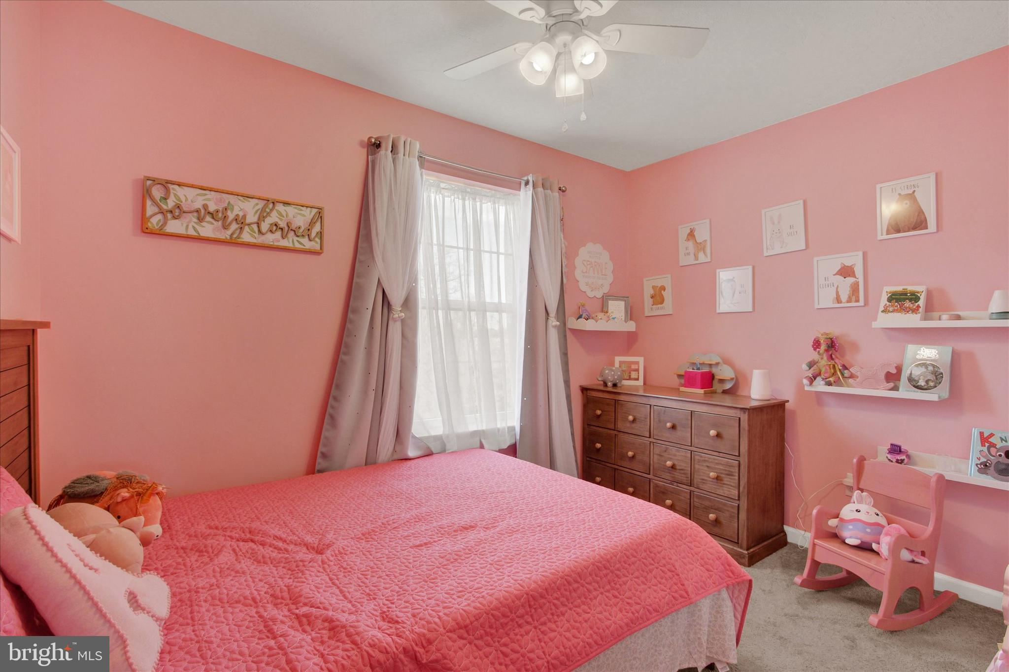 88 Clover Run Abbottstown, PA 17301 - Photo 11 of 15 a bedroom with a bed and a chandelier