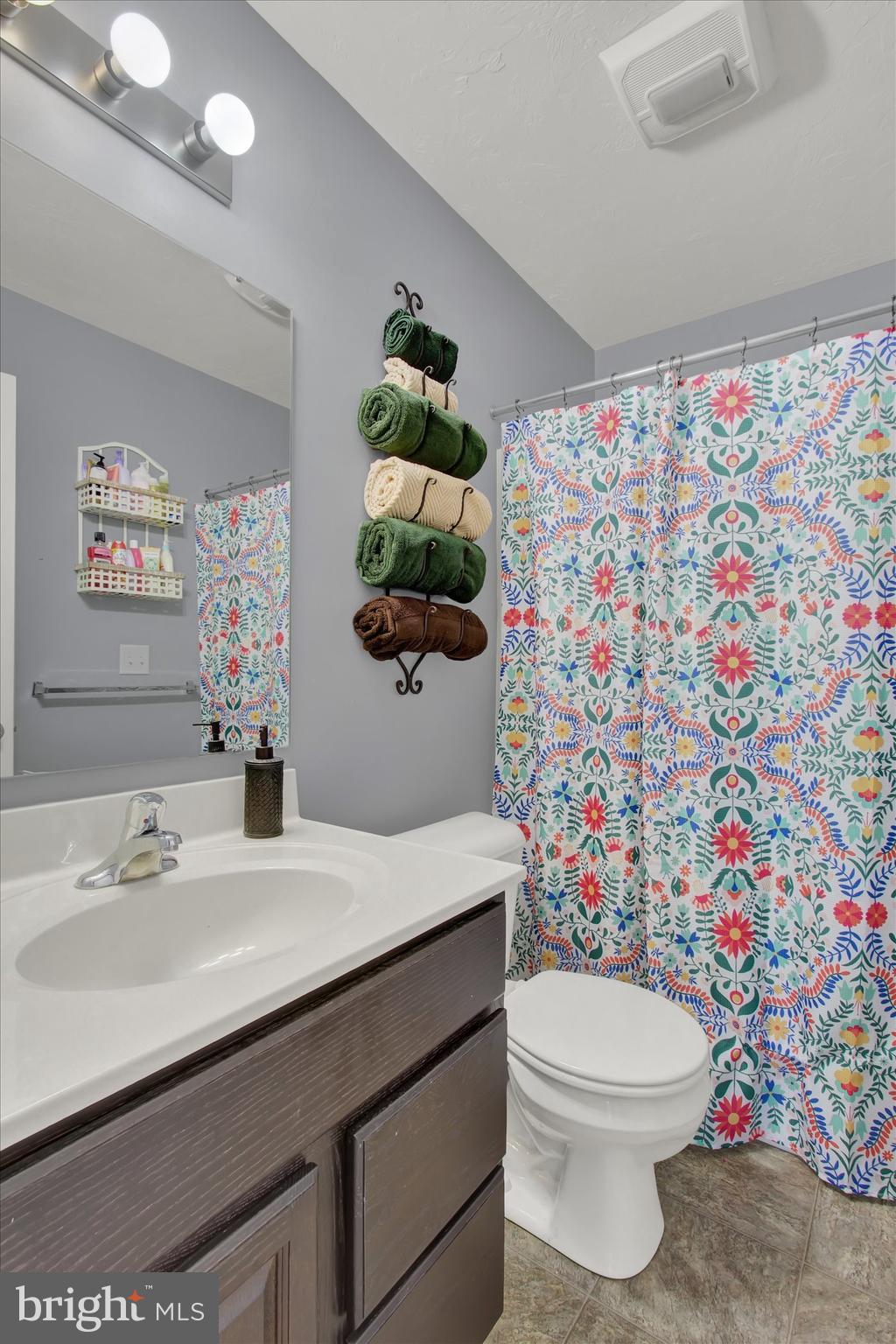 88 Clover Run Abbottstown, PA 17301 - Photo 12 of 15 a bathroom with a sink toilet and mirror