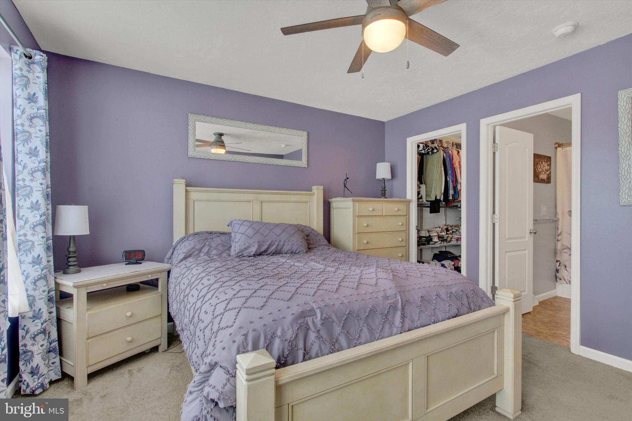 88 Clover Run Abbottstown, PA 17301 - Photo 8 of 15 a bedroom with a bed and a chandelier
