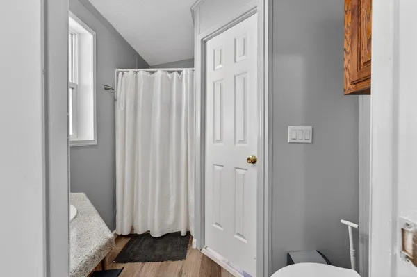 a view of bathroom with a toilet