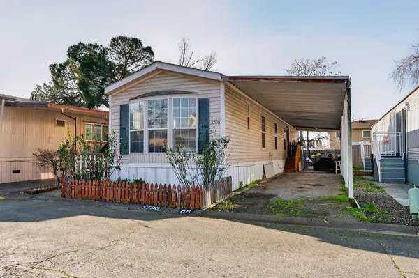a front view of a house with a porch