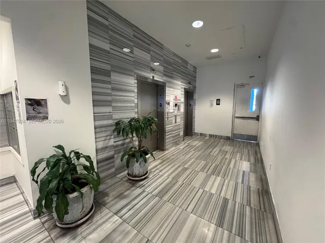 a view of a potted plants with wooden floor