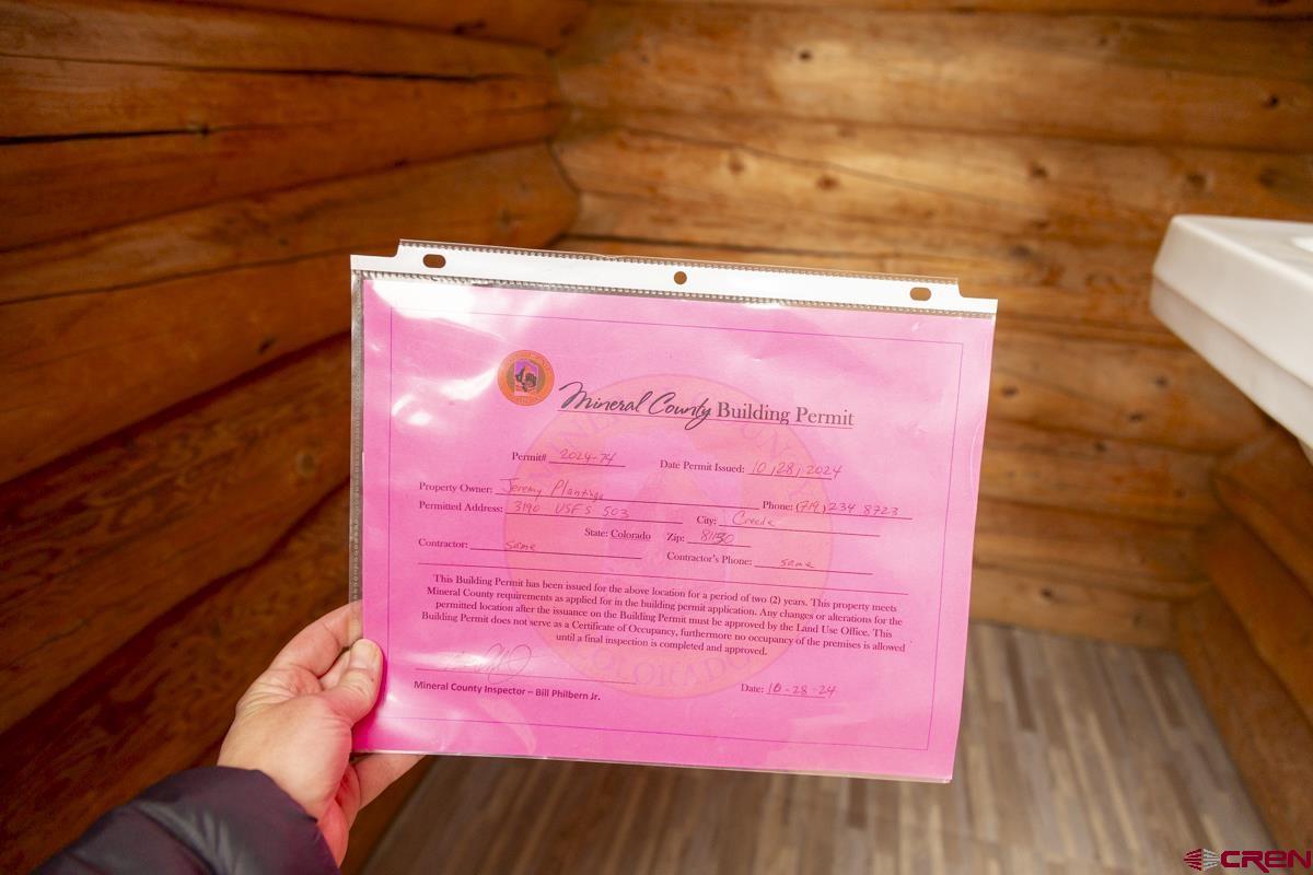 3190 Forest Road, Unit 503 Creede, CO 81130 - Photo 19 of 22 a view of a door and an outdoor space