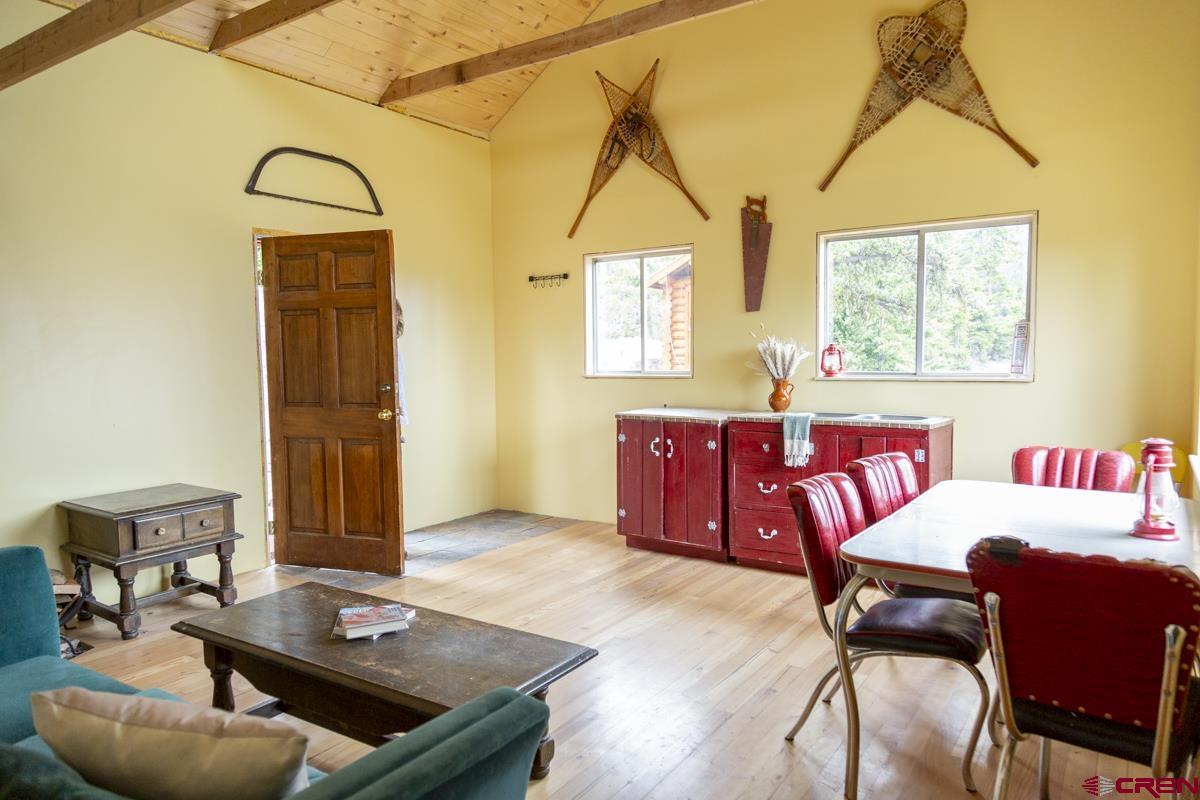 3190 Forest Road, Unit 503 Creede, CO 81130 - Photo 7 of 22 a living room with furniture and a window