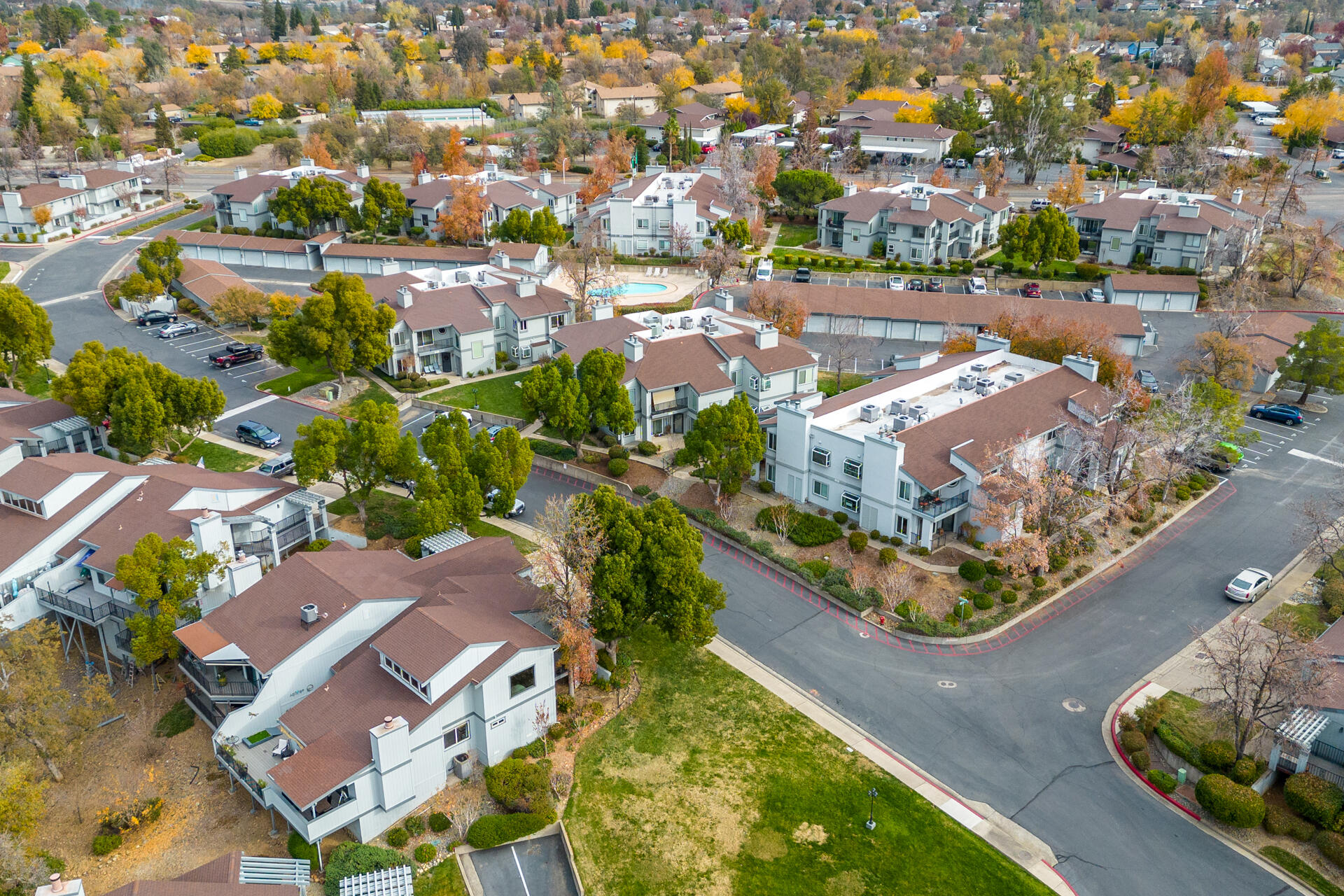 466 Ridgecrest Trail, Unit 136 Redding, CA 96003 - Photo 14 of 16 an aerial view of residential houses with outdoor space