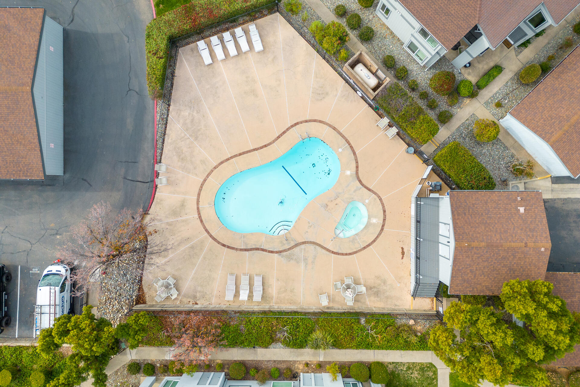 466 Ridgecrest Trail, Unit 136 Redding, CA 96003 - Photo 16 of 16 an aerial view of a house with a swimming pool