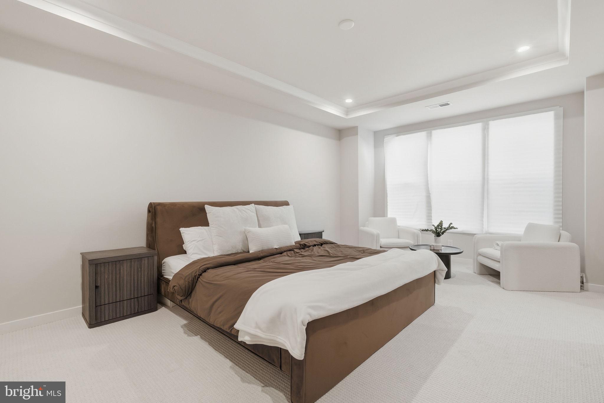 43489 Old Ryan Road Ashburn, VA 20148 - Photo 12 of 30 a bedroom with bed and a large window