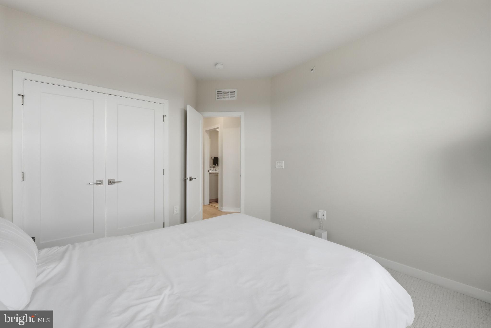 43489 Old Ryan Road Ashburn, VA 20148 - Photo 20 of 30 a view of a room with a bed and cabinet