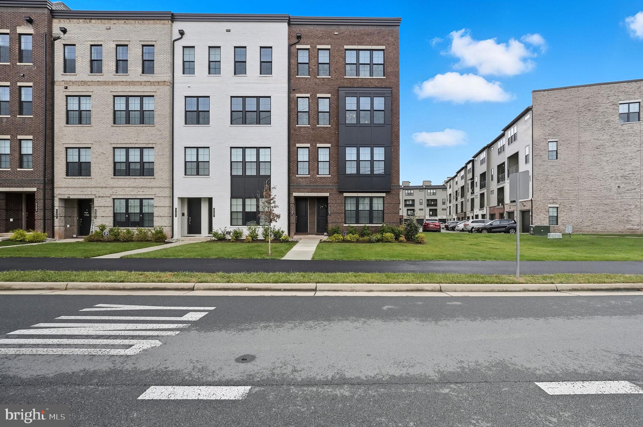 43489 Old Ryan Road Ashburn, VA 20148 - Photo 21 of 30 a view of building with a yard