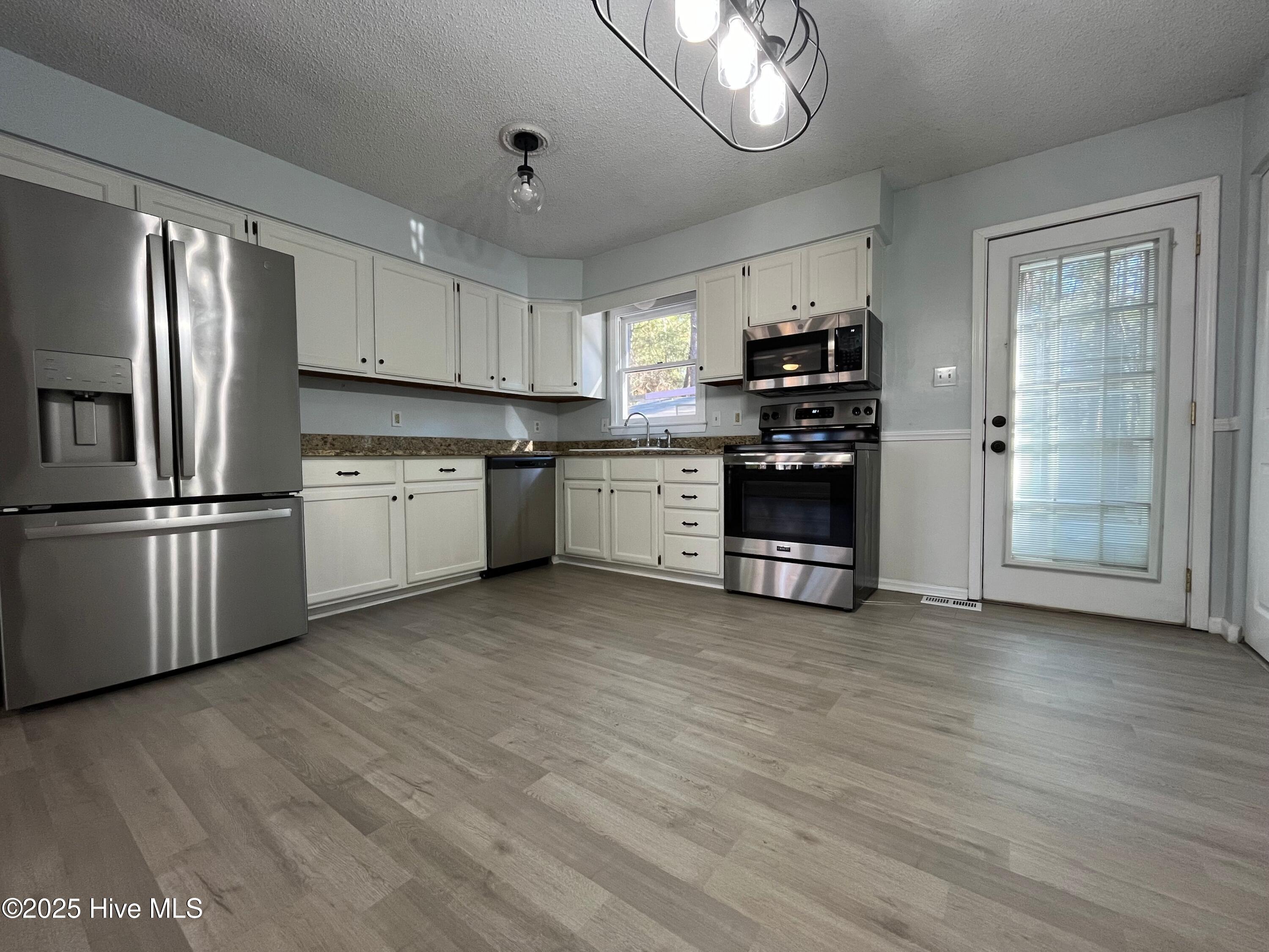 2550 Longleaf Drive Southwest Pinehurst, NC 28374 - Photo 5 of 14 2550 kitchen 1
