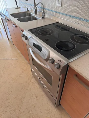 a close view of stove and microwave