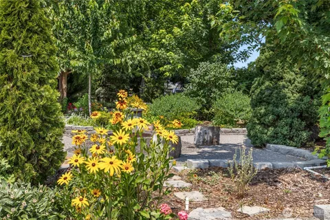 a backyard of a house with lots of green space