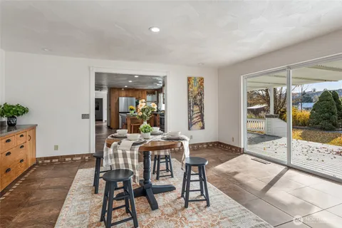 a workspace with furniture and window