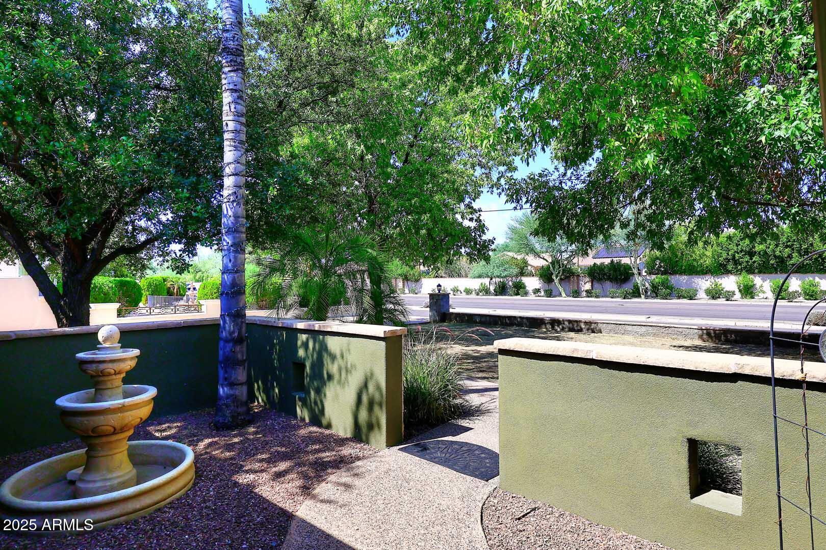 5449 East Thunderbird Road Scottsdale, AZ 85254 - Photo 11 of 75 a view of a swimming pool with a patio