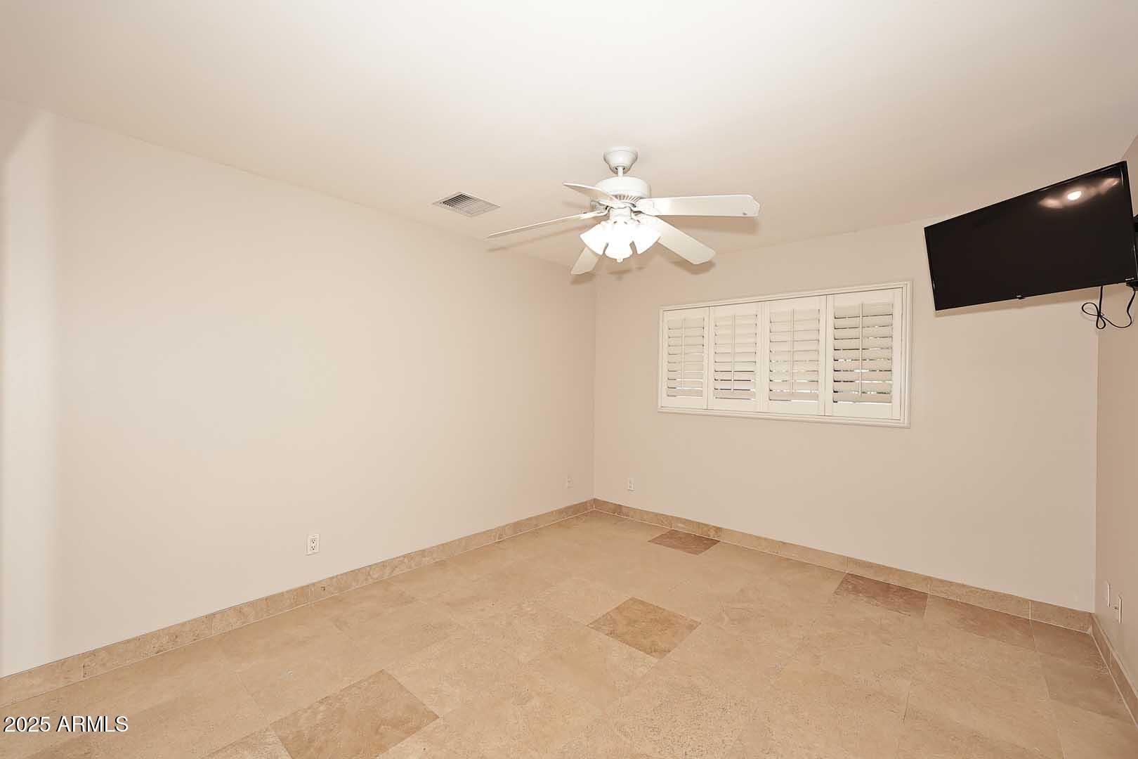 5449 East Thunderbird Road Scottsdale, AZ 85254 - Photo 26 of 75 an empty room with a window