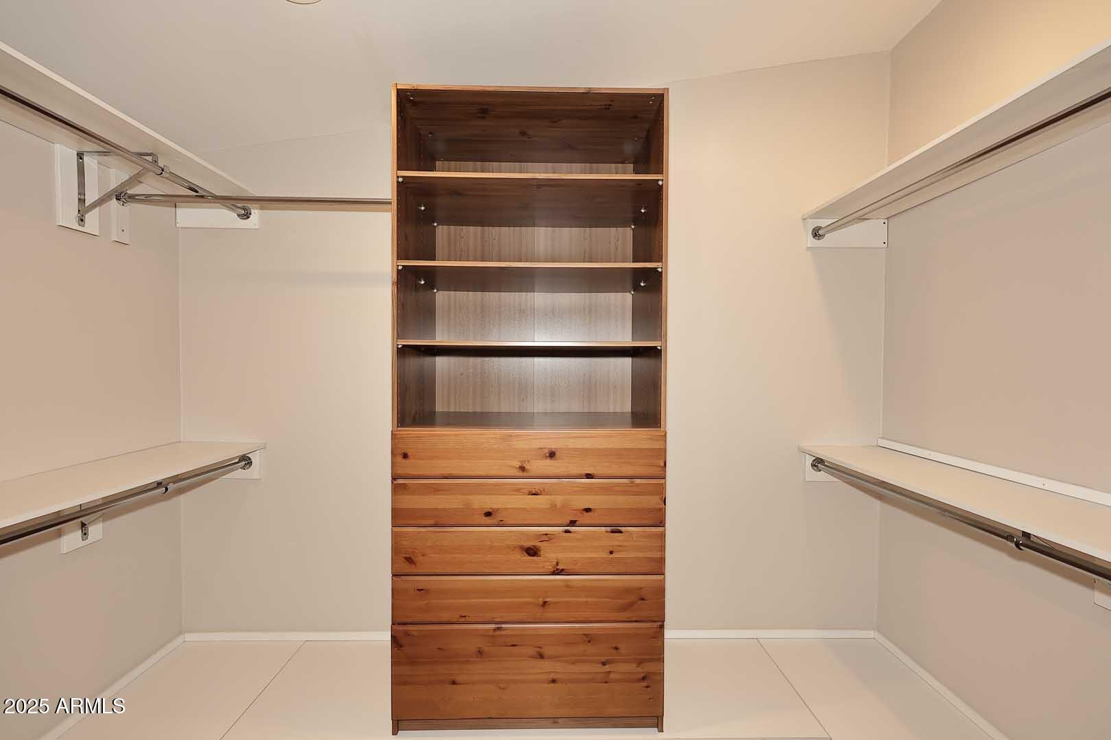 5449 East Thunderbird Road Scottsdale, AZ 85254 - Photo 37 of 75 a view of walk in closet with empty racks