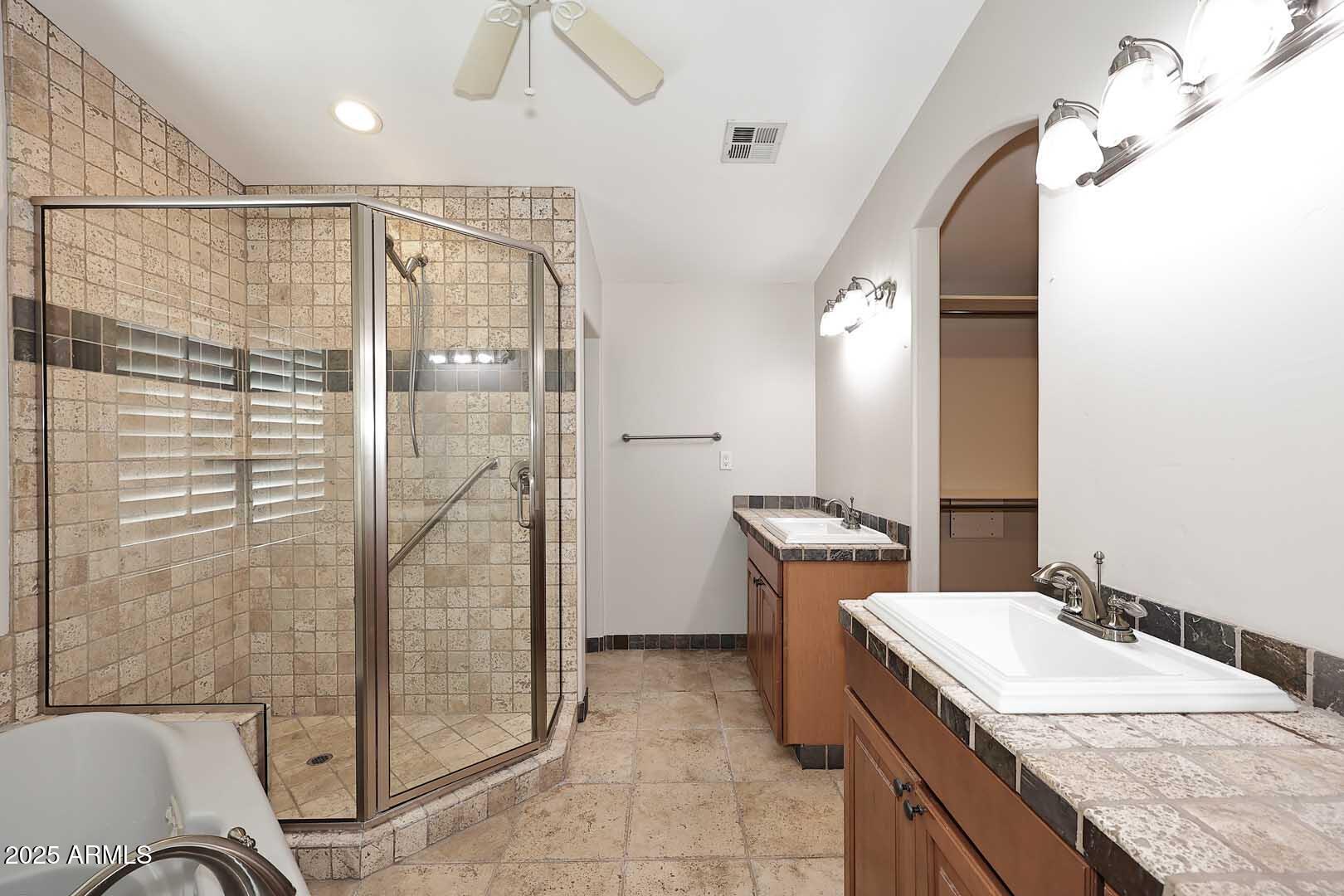 5449 East Thunderbird Road Scottsdale, AZ 85254 - Photo 38 of 75 a bathroom with a granite countertop sink and a mirror