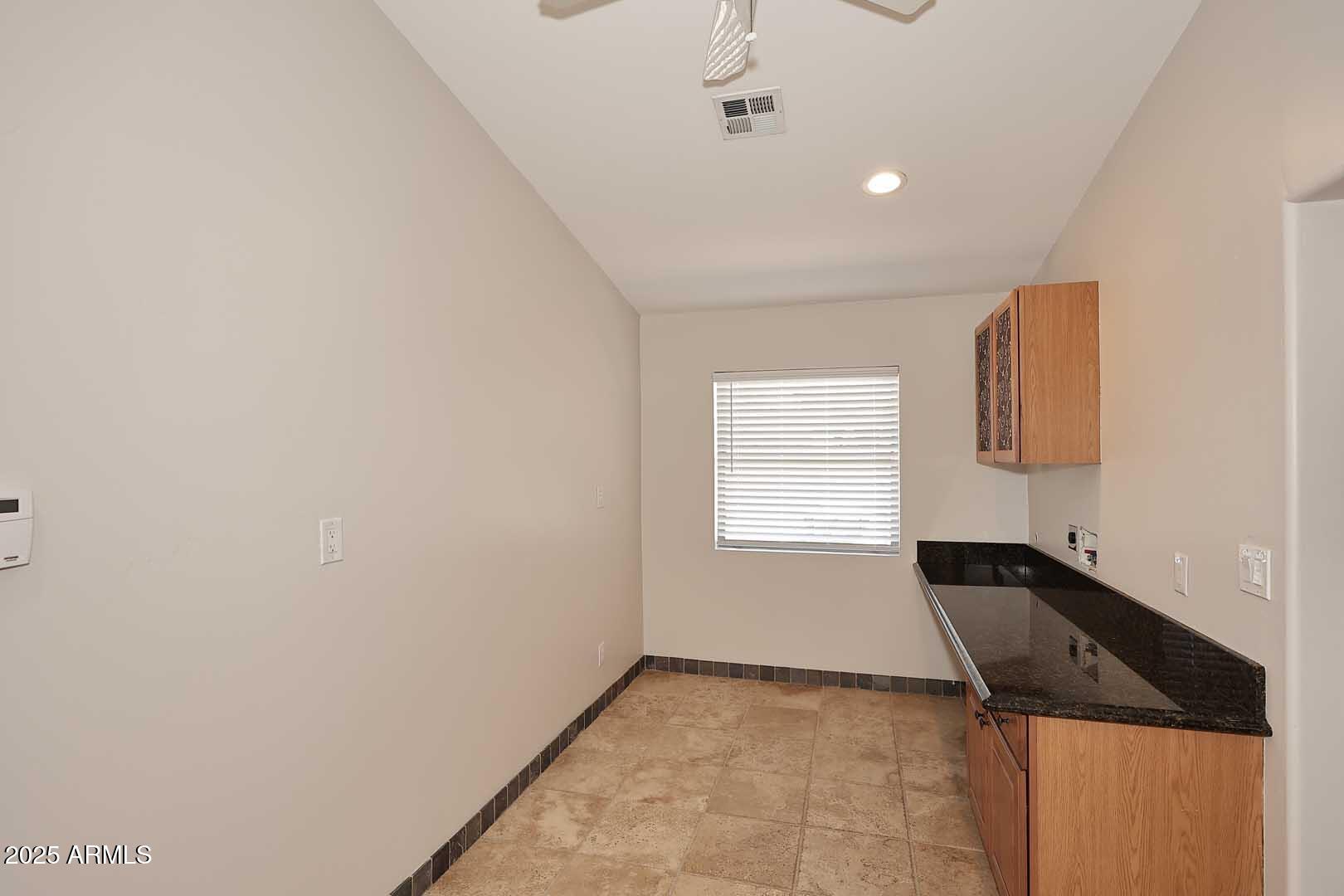 5449 East Thunderbird Road Scottsdale, AZ 85254 - Photo 40 of 75 a view of an empty room and window