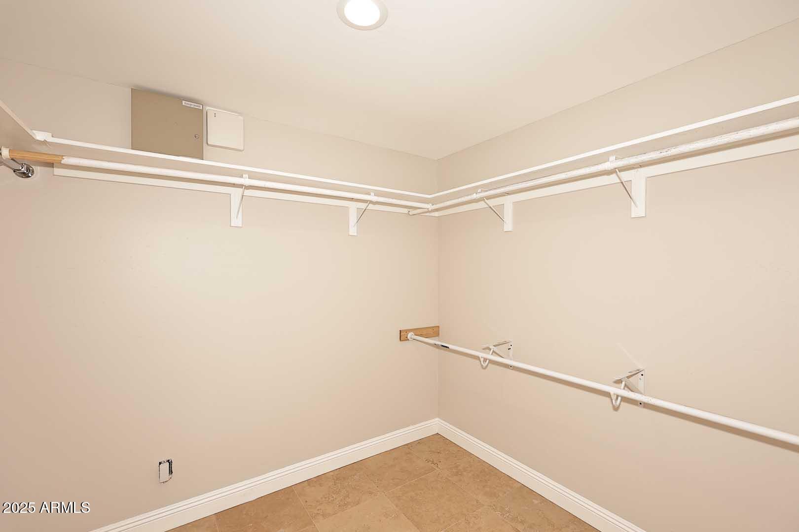5449 East Thunderbird Road Scottsdale, AZ 85254 - Photo 44 of 75 a view of a room with racks on the wall