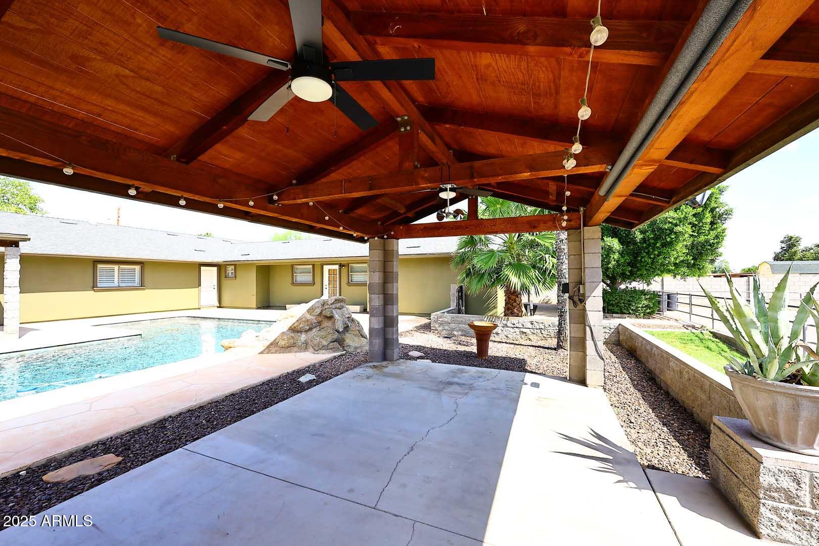 5449 East Thunderbird Road Scottsdale, AZ 85254 - Photo 54 of 75 a view of a backyard with a large tree