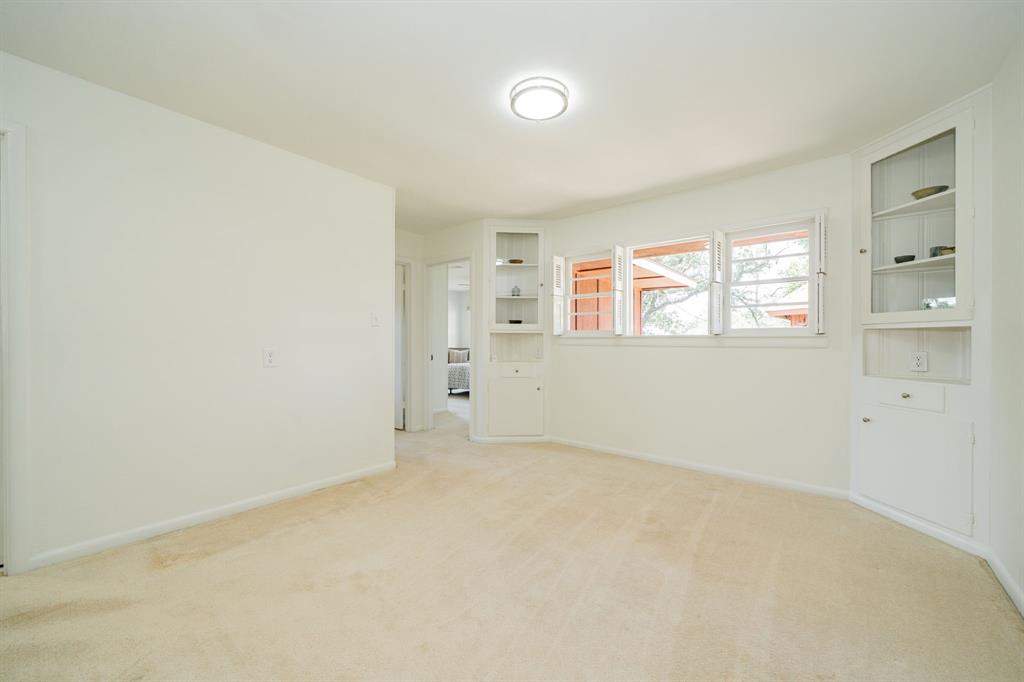 809 Cobb Street Bridgeport, TX 76426 - Photo 12 of 39 an empty room with windows