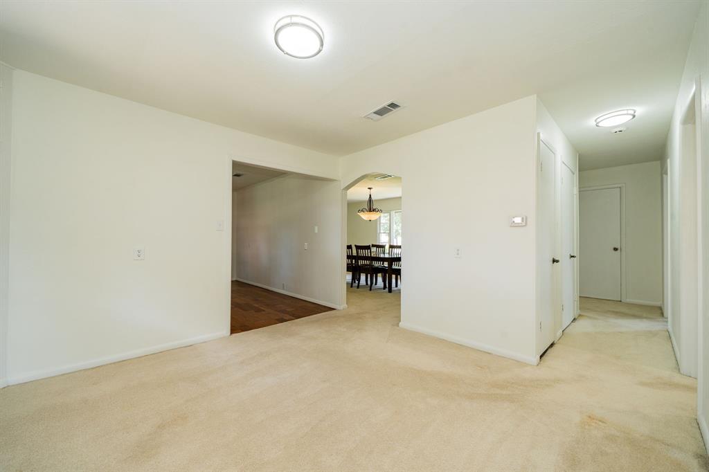 809 Cobb Street Bridgeport, TX 76426 - Photo 14 of 39 an empty room with a bathroom and mirror
