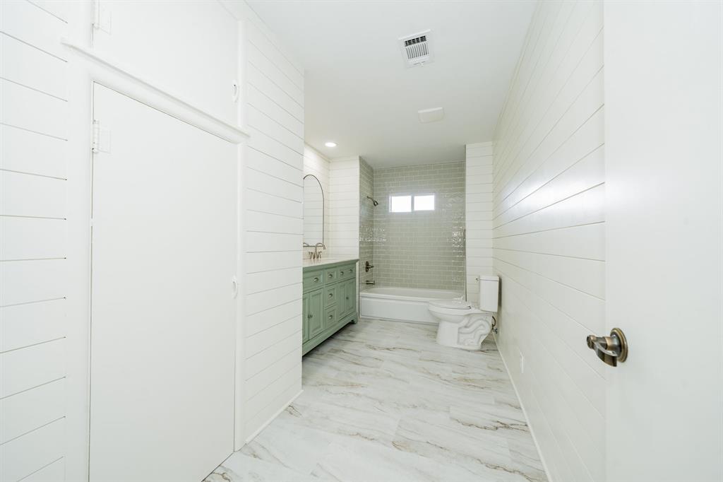 809 Cobb Street Bridgeport, TX 76426 - Photo 16 of 39 a bathroom with a sink and a toilet