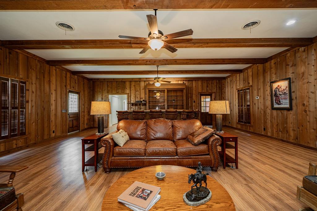 809 Cobb Street Bridgeport, TX 76426 - Photo 3 of 39 a living room with furniture and wooden floor