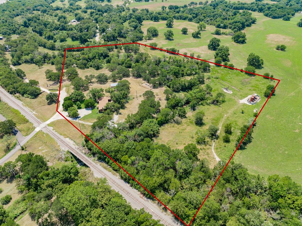 809 Cobb Street Bridgeport, TX 76426 - Photo 39 of 39 an aerial view of a residential houses with outdoor space and street view