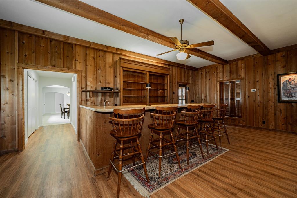 809 Cobb Street Bridgeport, TX 76426 - Photo 4 of 39 a view of a dining room with furniture and wooden floor